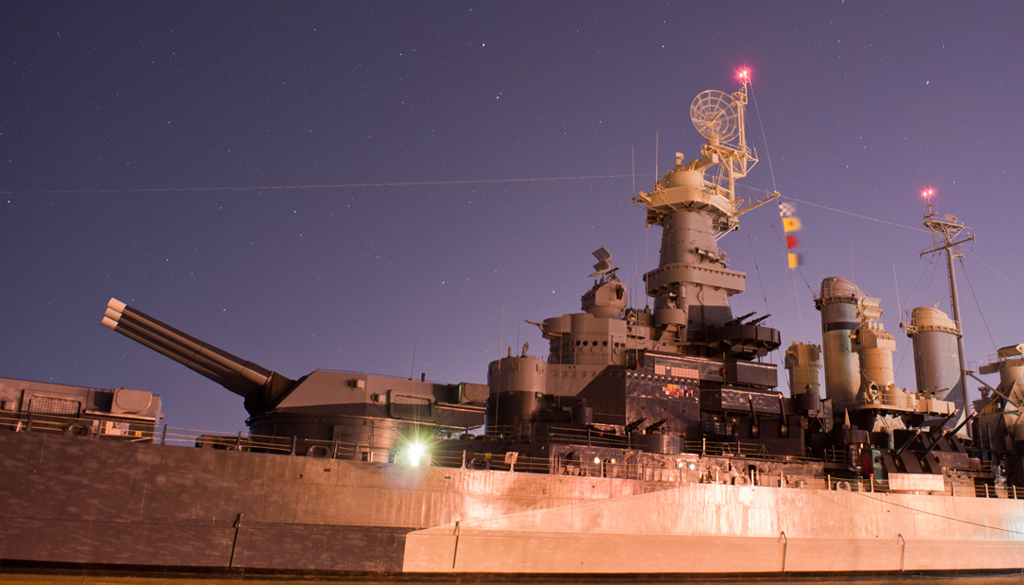 Wilmington, NC / USA: USS North Carolina at night.